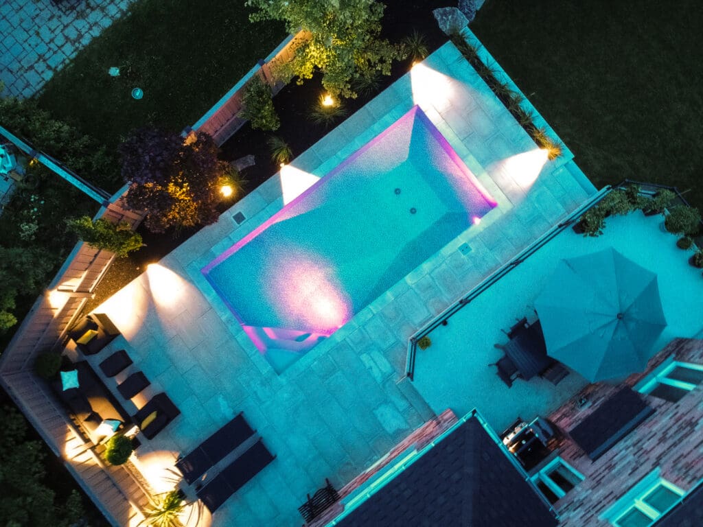 Aerial drone photo of a completed backyard pool project