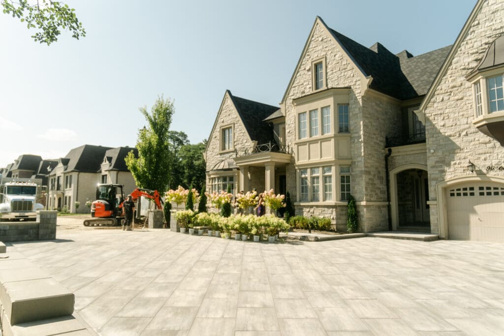 Large interlock driveway in front of a custom home in York Region