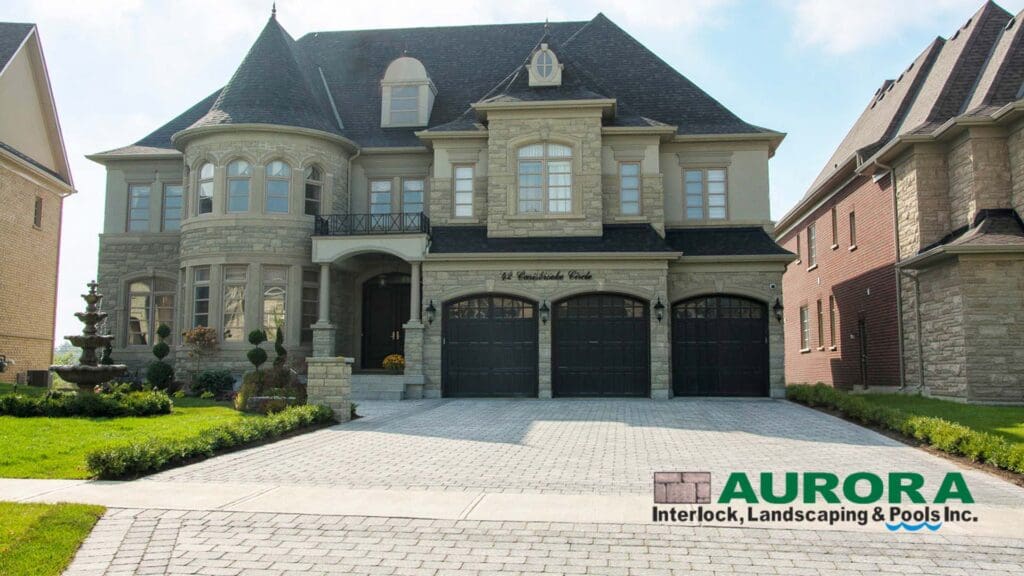 Interlock driveway and front entrance by Aurora Interlock & Pools